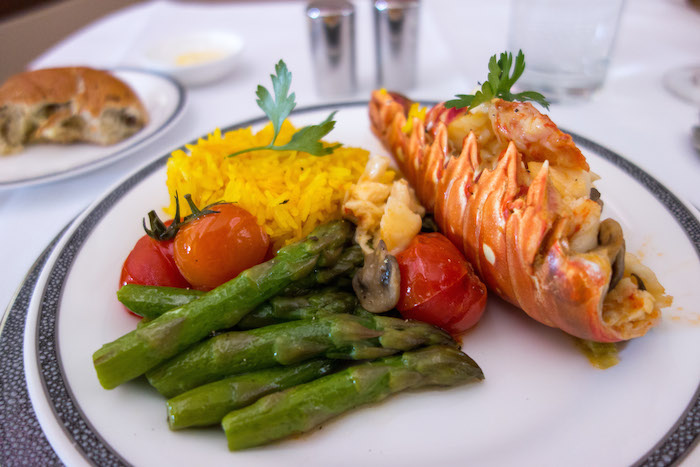 Lobster Thermidor with Buttered Asparagus, Slow-roasted Vine-ripened Tomato, and Saffron rice